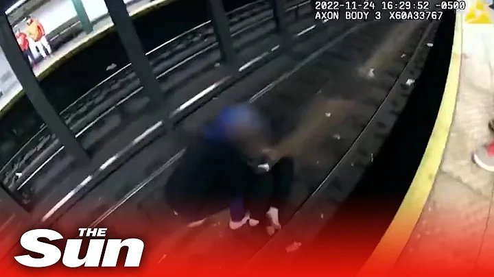 Police officers rescue man stuck on tracks seconds before train arrives - DayDayNews