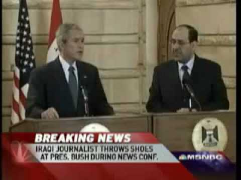 Bush is OWNED!!! (Iraqi reporter throws shoes at Bush, calls him dog)