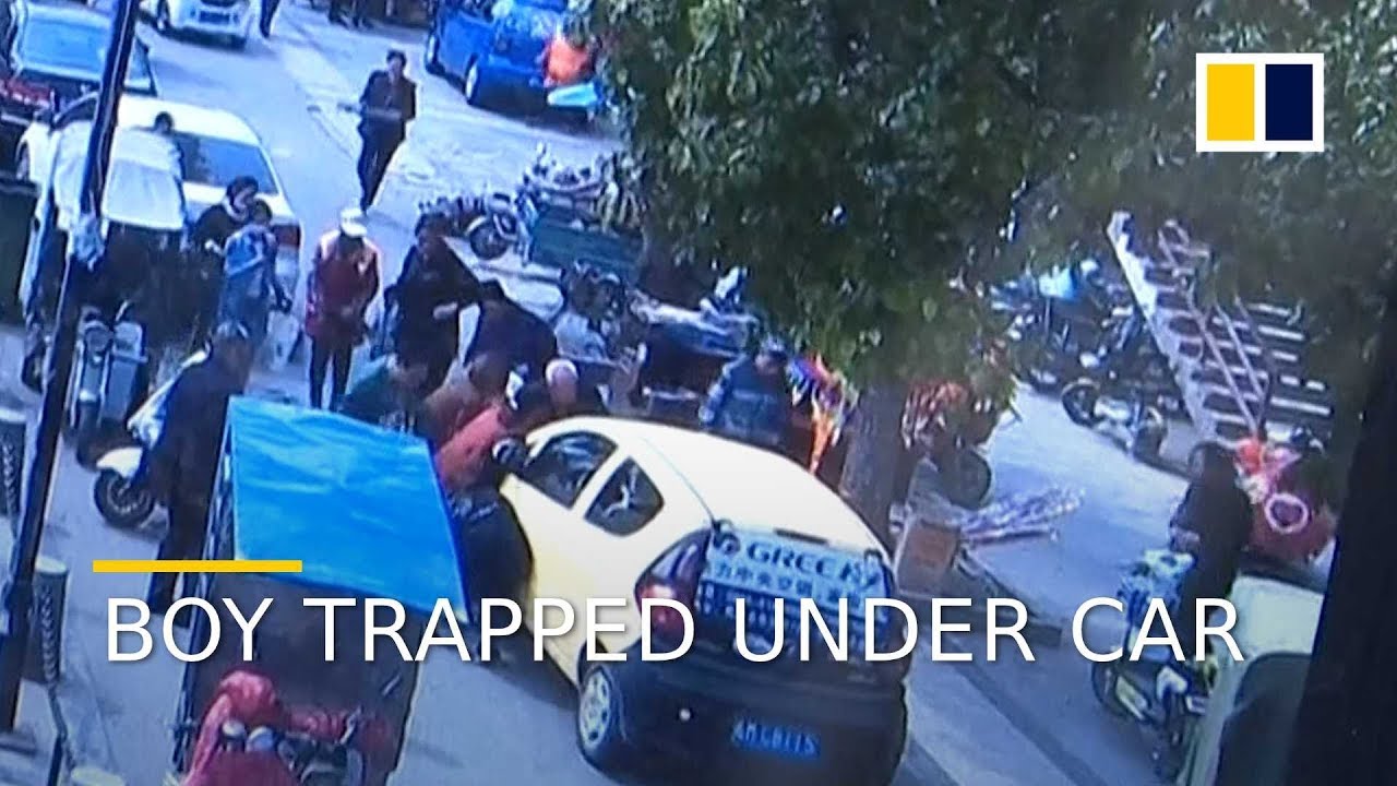 Boy rescued after being run over by car in east China - YouTube