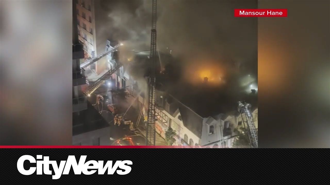 150 firefighters battle blaze in downtown Montreal - YouTube