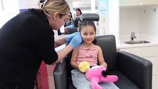 Nadine gets her ears pierced at Ulta! 