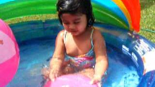 Aurora Playing In her Rainow Pool 2/3