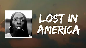 Lost In America (Lyrics) by Lo Village