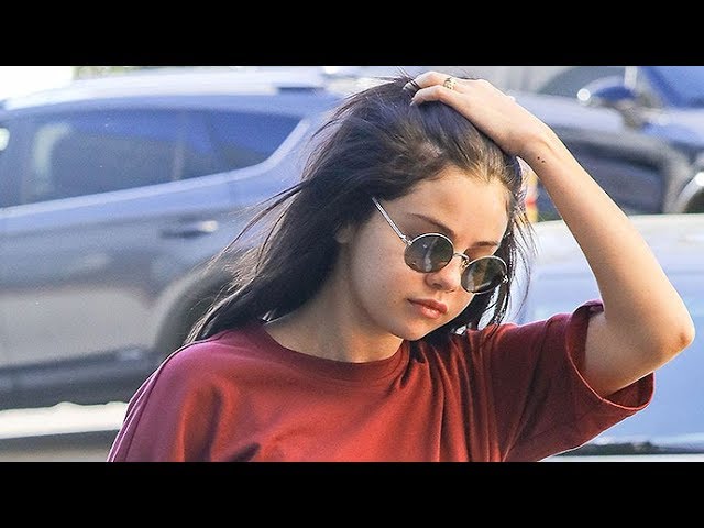 Selena Gomez wows in all red as she flashes hint of torso after leaving  grueling Pilates class