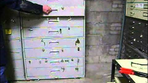 Install file cabinet outside security bar swing a way