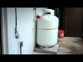 Propane tank and outdoor tankless water heater installation