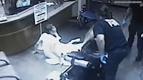 Watch: Paramedic dumps cancer patient off gurney