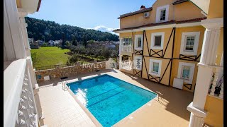 Charming 3-Bedroom Duplex Apartment with Pool and Mountain Views in Green Uzumlu Village
