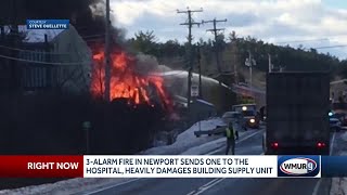3-alarm fire in Newport sends 1 to hospital, heavily damages building supply unit