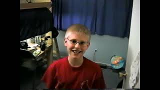 Hounshell Movies/2004 Christmas, Daniel's band concert, Amy and kids playing, Tedo as puppy