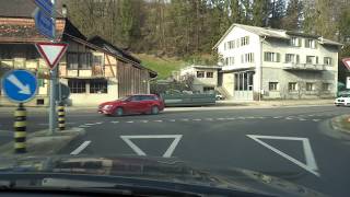 Driving from Mittelhäusern to Düdingen via an old traditional wooden bridge, Switzerland in 4K