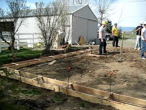 Enterprise Design and Innovations and Central Washington University's Construction Management Program continue with the garage project at the Scarlett residence between Kittitas and Ellensburg. Today, April 19, Josh and the crew ready the site for the footing foundation concrete pour.