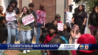 Reynolds High School students walk out over job cuts