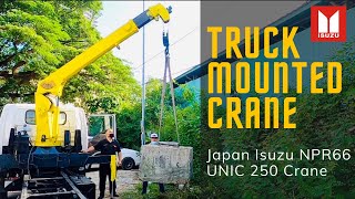 ISUZU TRUCK MOUNTED CRANE LIFTING 2 TONNE CONCRETE BLOCK | JAPAN ISUZU NPR66 @ UNIC 250 CRANE
