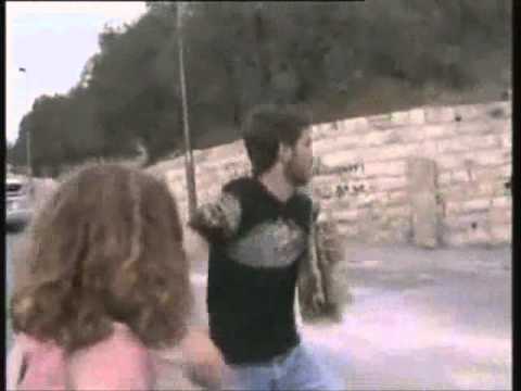 man runs over kids throwing rocks