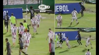 Player defends himself with a CORNER FLAG after being chased