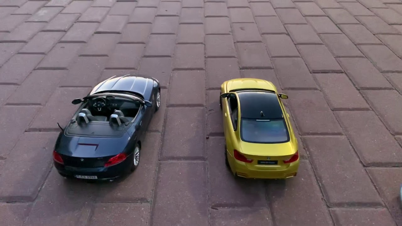 BMW Z4 vs M4 Coupe - YouTube
