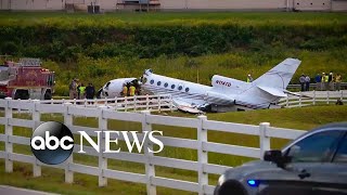 Plane breaks in half after speeding off runway