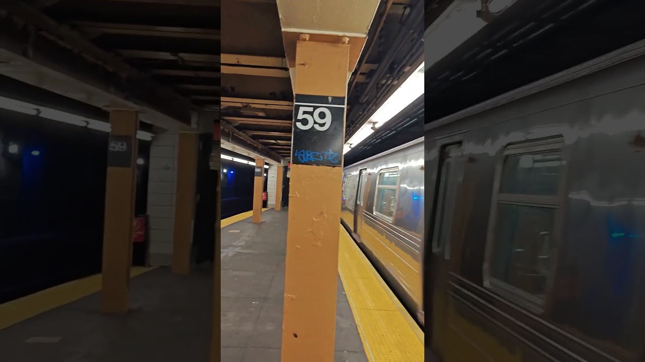 An R68A Coney Island-Stillwell Avenue Bound (N) Train Approaching 59 Street 