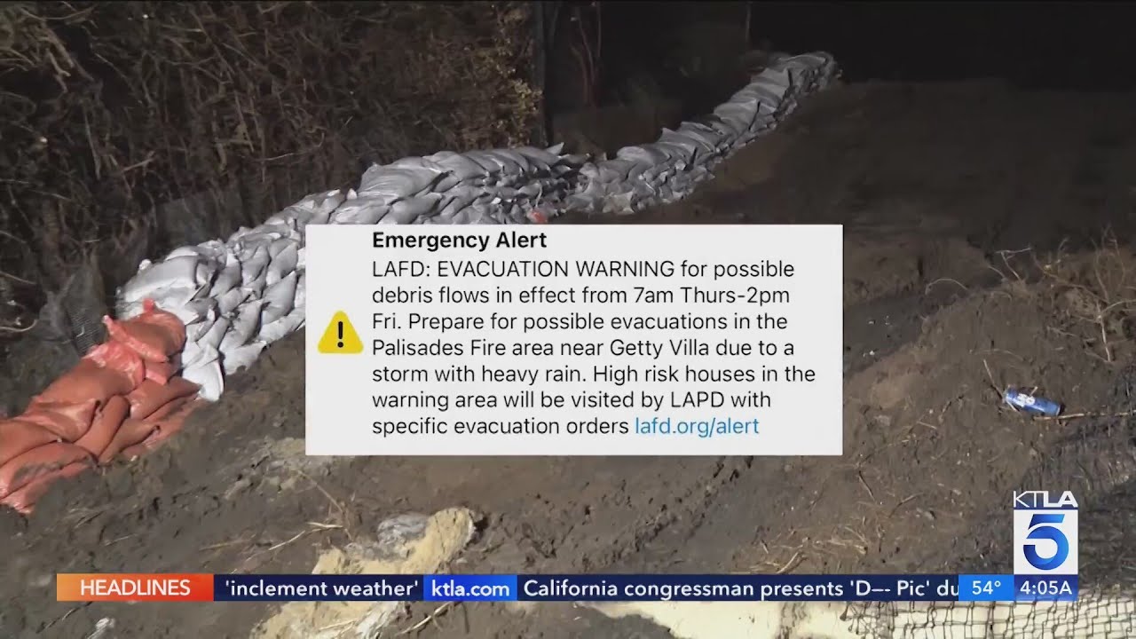 Evacuation orders, warnings for burn zones as storm soaks SoCal - YouTube