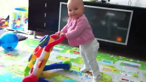 Elodie using walker
