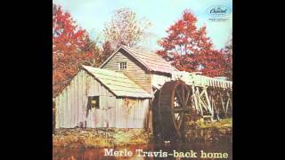 Merle Travis - Possum Up A Simmon Tree