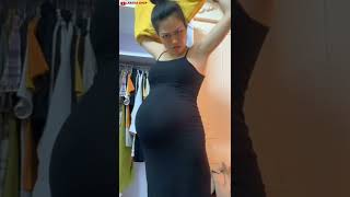 pregnant mom selling discounted winter clothes