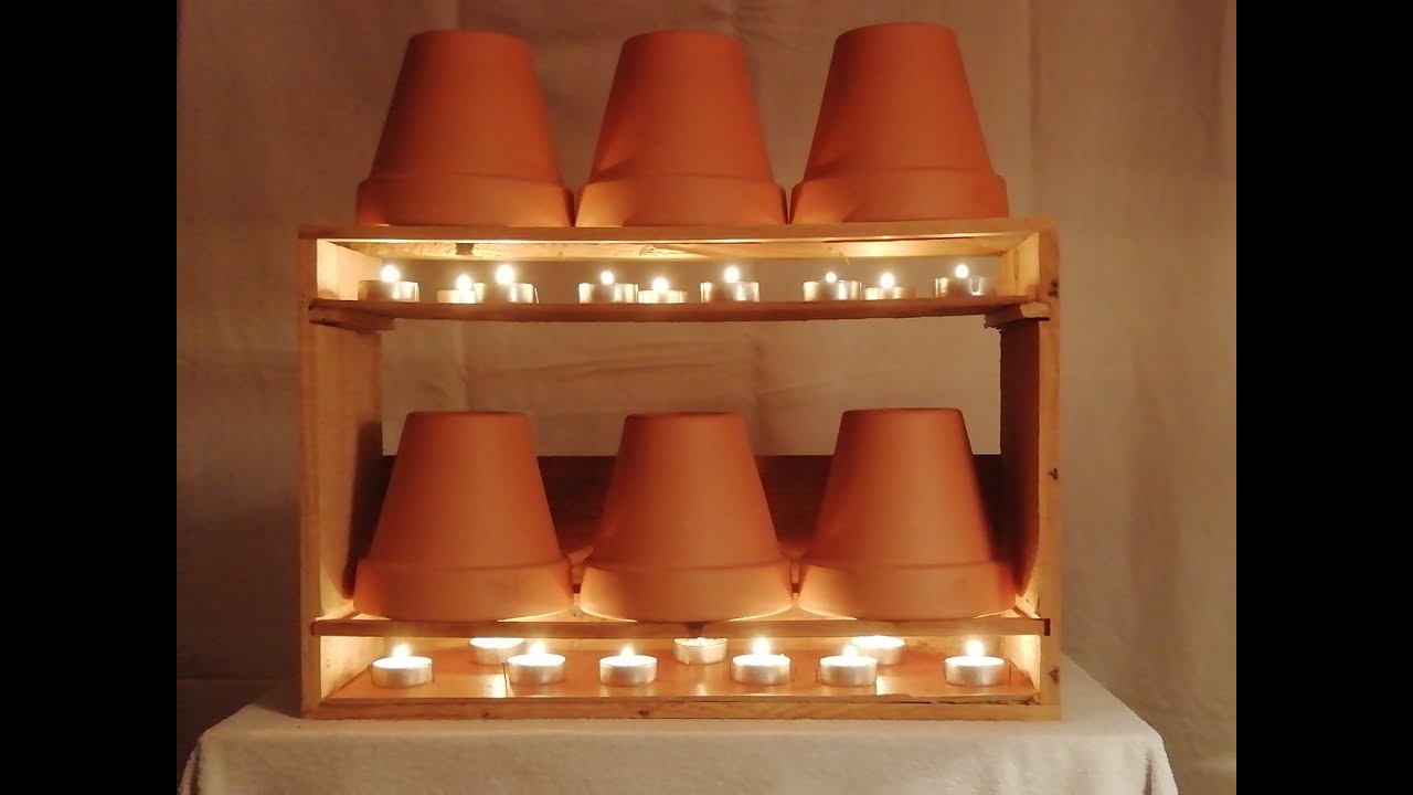 COMMENT FABRIQUER UN ENORME CHAUFFAGE D'APPOINT.  AVEC 6 POTS DE FLEUR ET 18 BOUGIES
