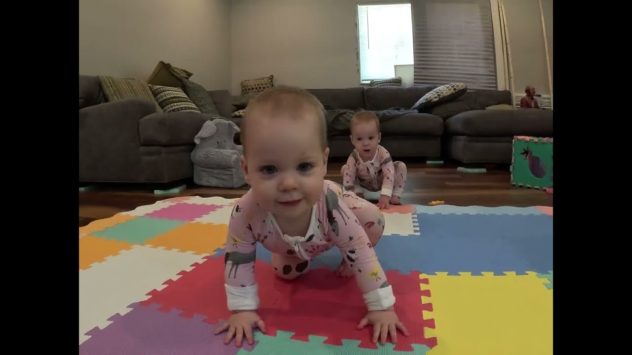 Twins practice walking without walkers!