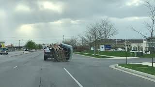 Trailer carrying mattress on back of pick up truck swerves and loses control
