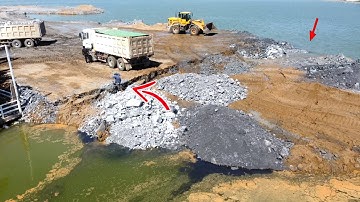 WOW !! Land slide Sinking into Deep water Team Dump truck Transport stone Filling Up again