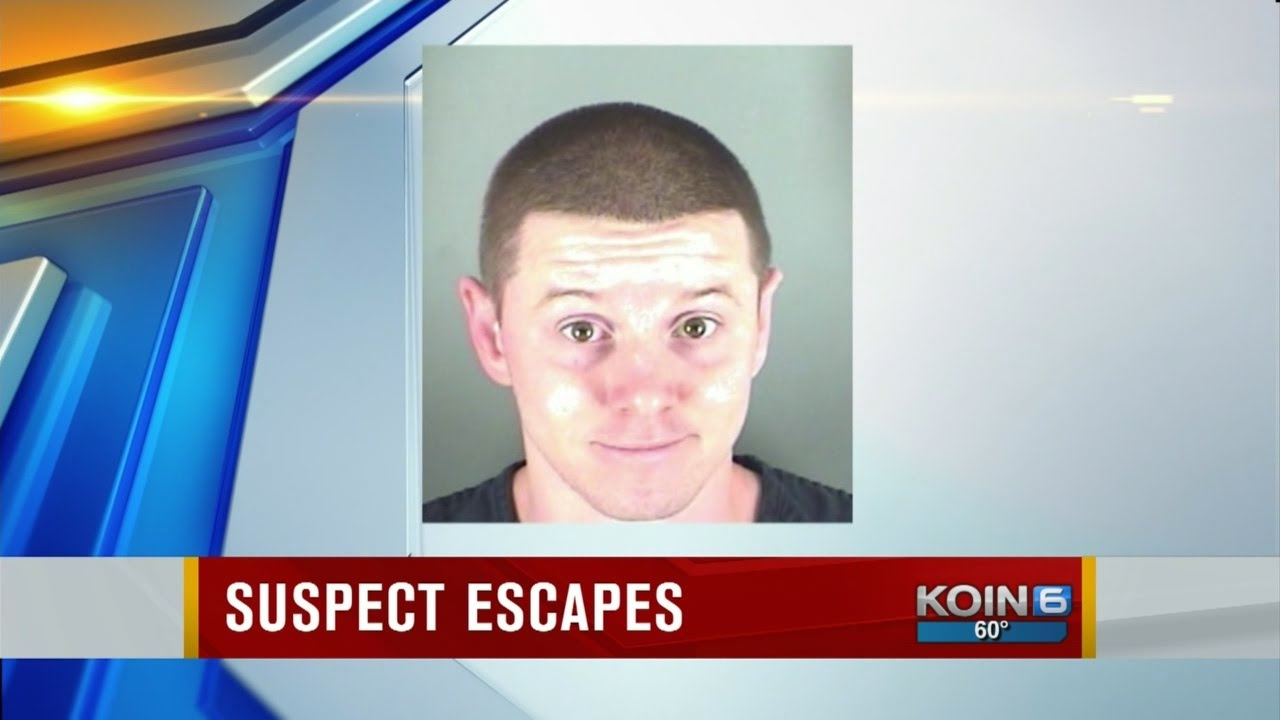Suspect in handcuffs escapes custody in Clark Co. - YouTube