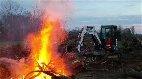 Digging Burn Pit & Burning Slash Day 1-Bobcat E42 Excavator