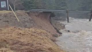 Road Washed Away as Heavy Rain Causes Flash Flooding