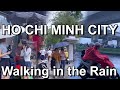 Ho chi minh city vietnam  walking in the rain