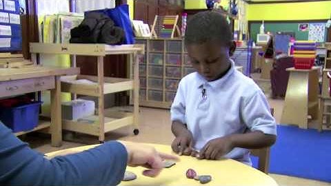 Sorting Rocks with Child 32 (Early Math Collaborative at Erikson Institute)