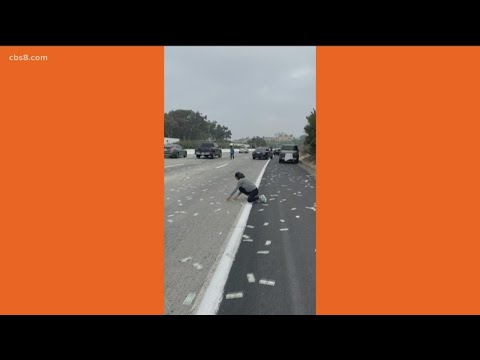 Cash on San Diego freeway | Traffic incident with armored vehicle causes chaos on Interstate 5