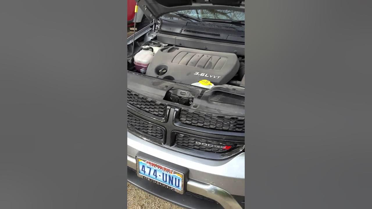 How to jump start a dodge journey with hidden battery - YouTube