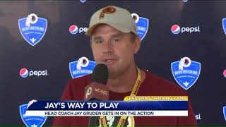 Head coach Jay Gruden plays defense