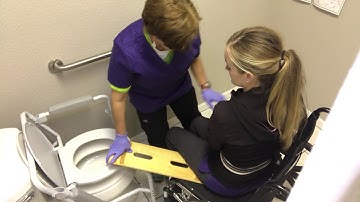 Maximizing Mobility: Transfer Techniques with Slideboard Wheelchair to Toilet Maximum Assistance"