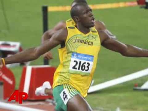 Usain Bolt rewrote the record books again and captured his first Olympic medal Saturday, running the 100-meter dash in a stunning 9.69 seconds for a blowout win that could have been even worse.(Aug. 15)