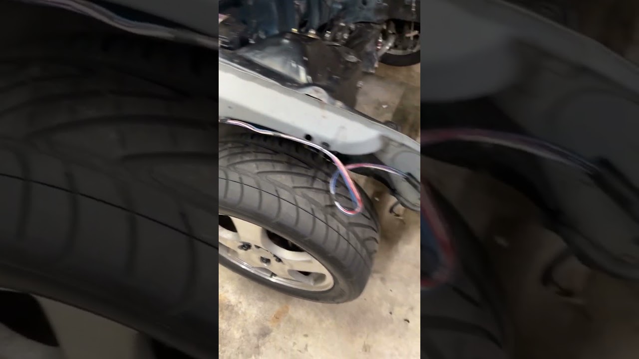 Getting my headlight harness tucked 