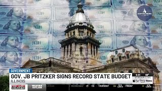 Pritzker signs nearly $56B budget with new business taxes as he seeks 3rd term