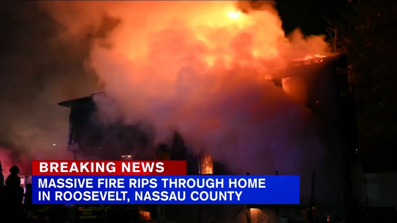 Massive fire rips through home in Roosevelt, Nassau County 