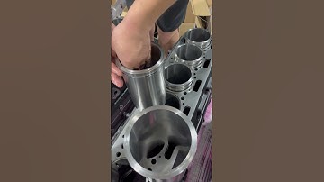 Installing the heart of the engine — cylinder liner going in! #enginebuild #weichai #dieselpower