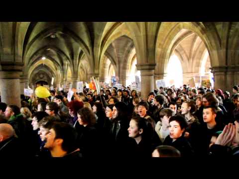 Glasgow Uni students chant in the Cloisters