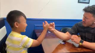 I almost COMPLETELY DESTROY my kid cousin at arm wrestling