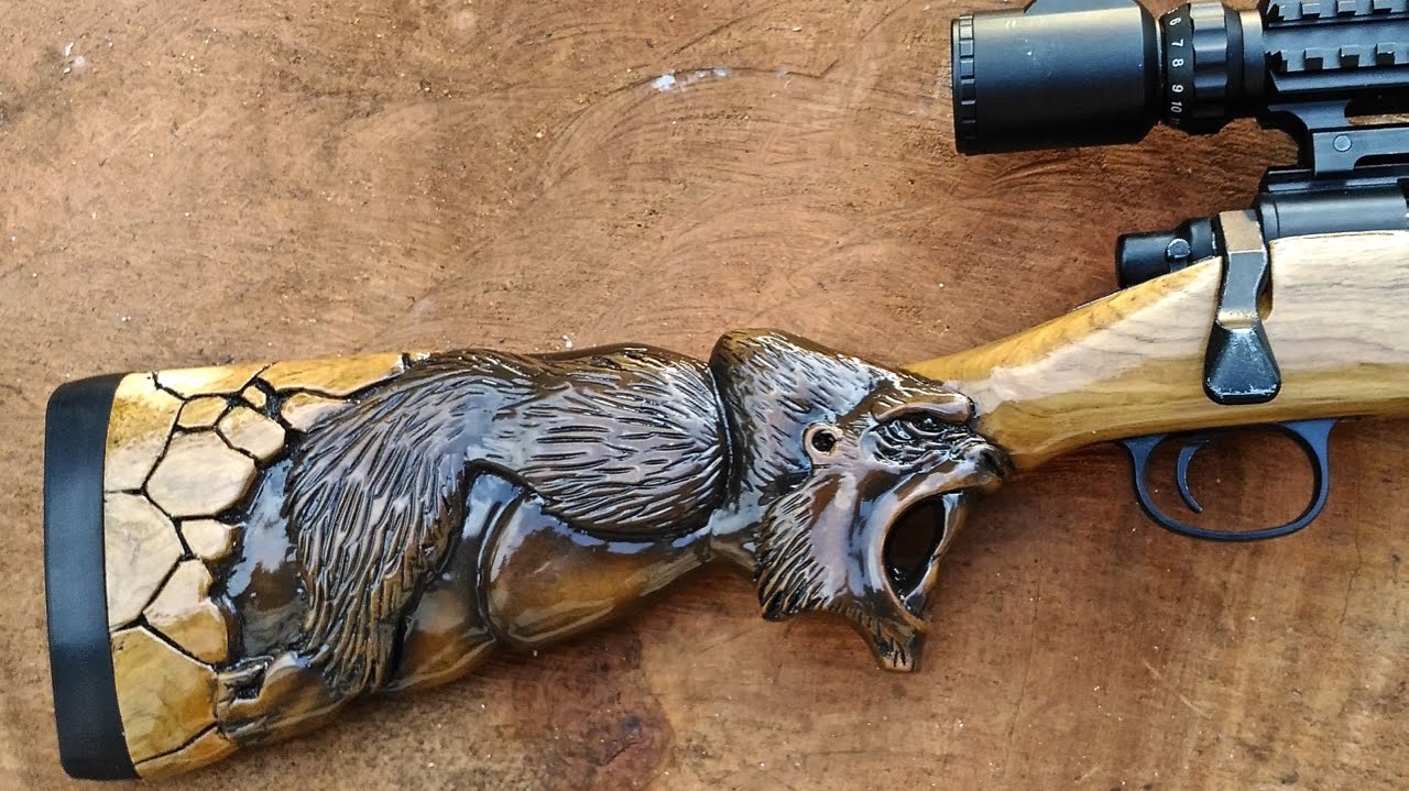 Hand carved Gun Stock from Taring Carving Indonesia - YouTube