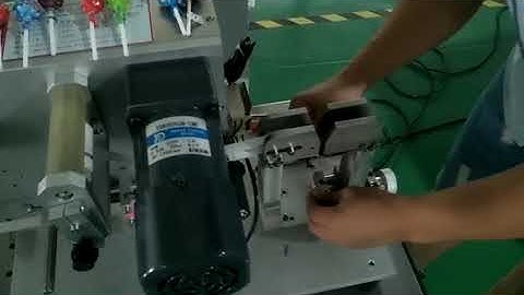 Lollipop labeling machine