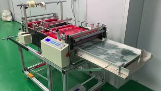 Vility roll to sheet cutting machine